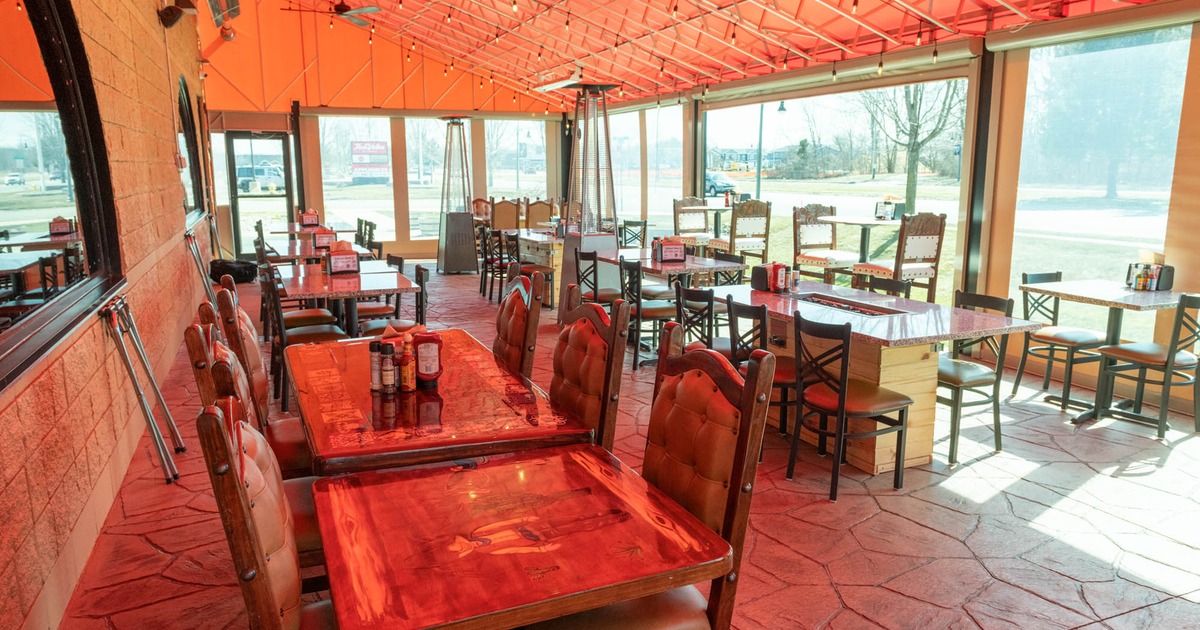 Covered patio area, tables and chairs