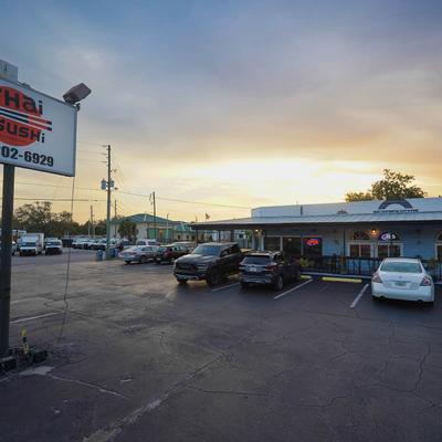 Exterior, iThai and Sushi restaurant, parking lot and pylon sign.