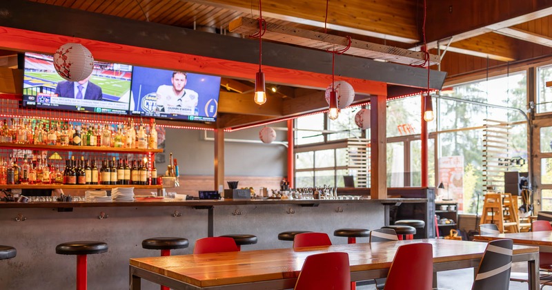 Interior, seating place with bar in the background