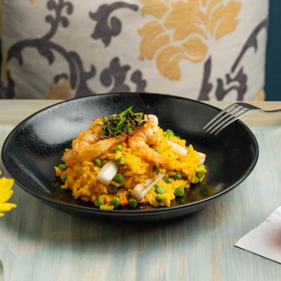 Risotto alla Veneziana (GF) Carnaroli rice with Saffron, shrimp & Calamari.