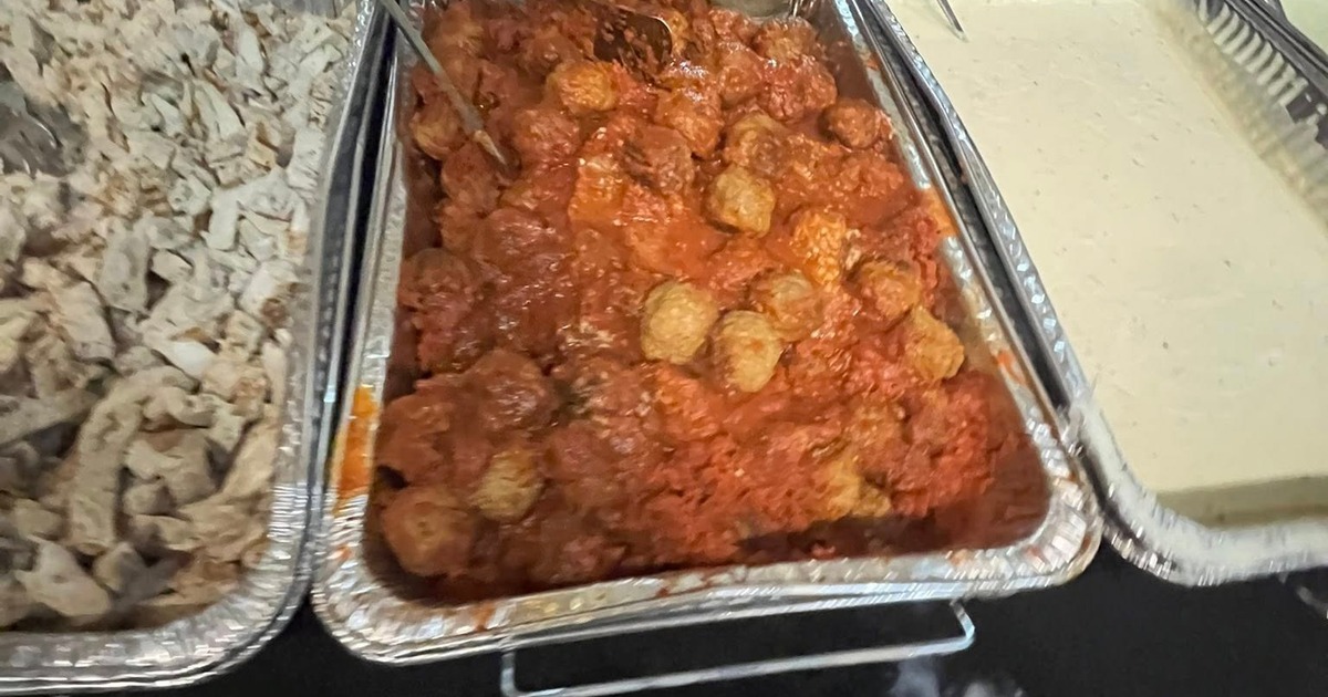 Catering setup featuring a variety of Italian dishes