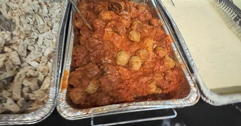 Catering setup featuring a variety of Italian dishes