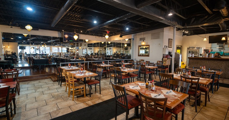 Nicely done dining area with set dining tables ready for guests