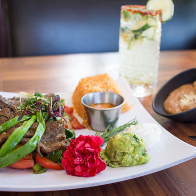 A steak with a margarita.