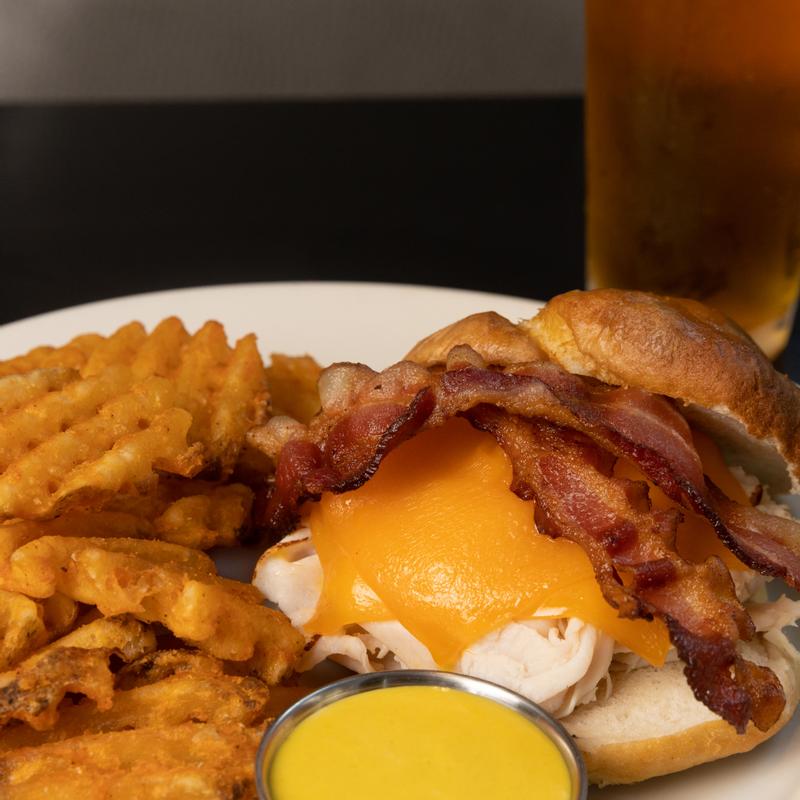 Turkey Melt On A Pretzel Roll photo
