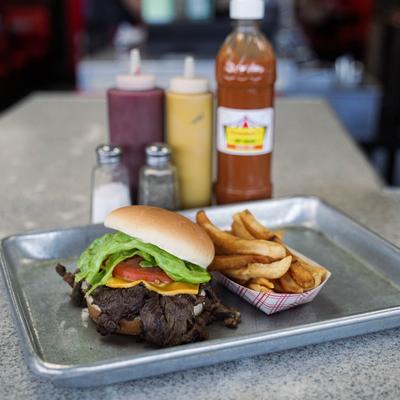 steak sandwich and french fries.