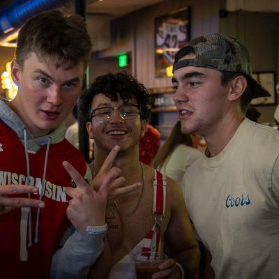 Three people posing for a photo.