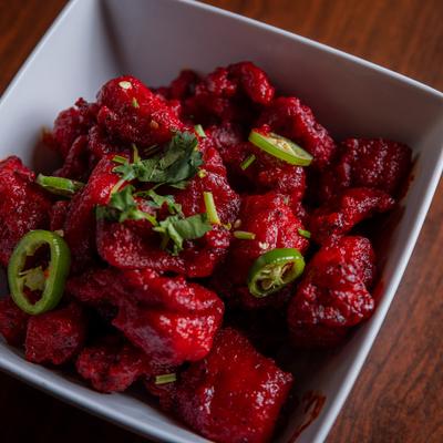 Spicy deep fried boneless chicken, seasoned with herbs, spices, and jalapenos.