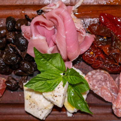 Antipasti Della Casa, cured meats, sun-dried peppers, cured olives and cheeses
