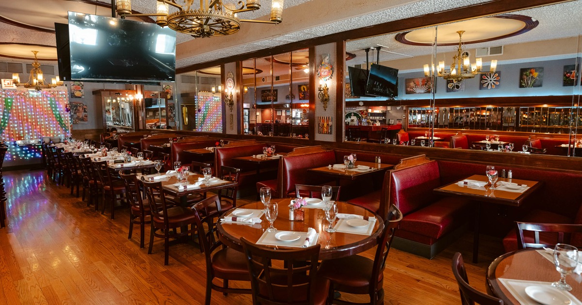 Interior, dining area with tables set for guests