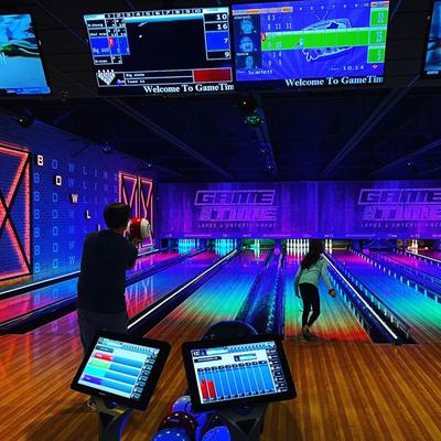 People bowling.