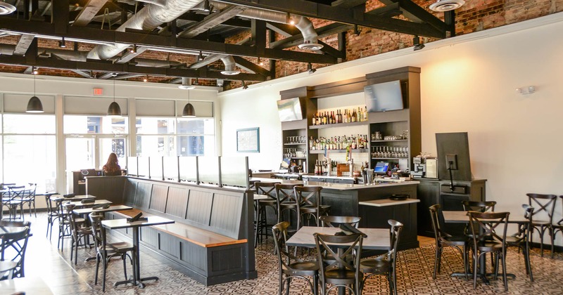 Interior, view of dining area, bar on the right
