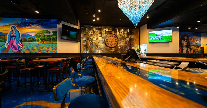 Bar table and stools, side view