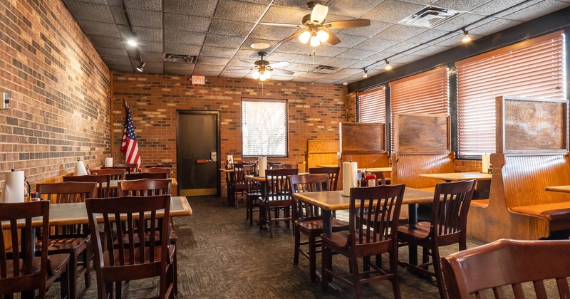 Interior, tables for four, ceiling fan