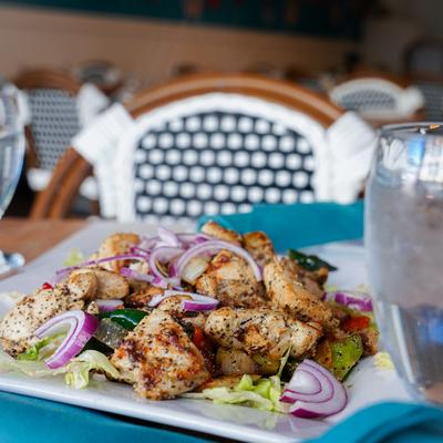 Spicy chicken dish cooked with black pepper.