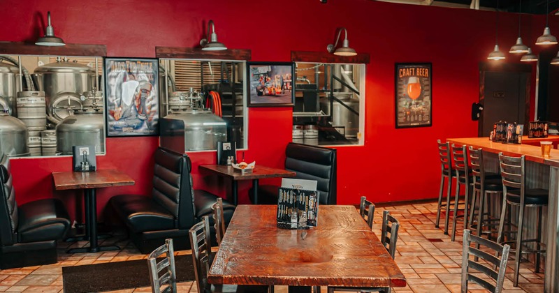 Interior, seating area, bar on the right, booth area in the back