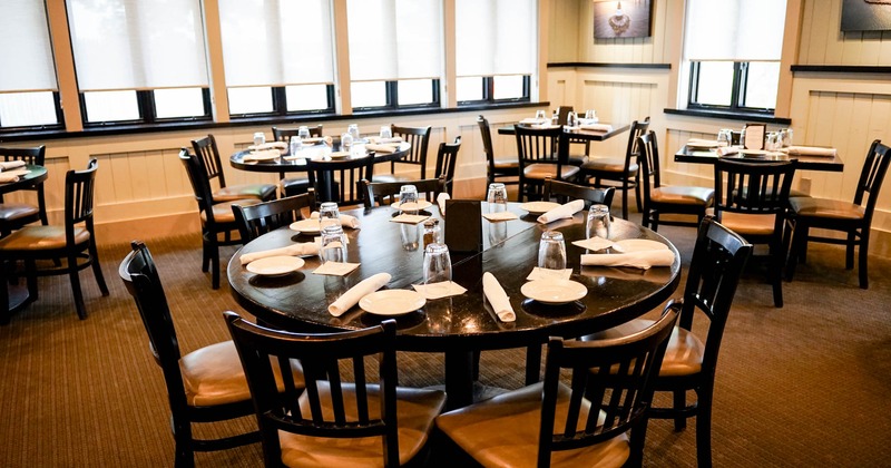 Interior, a round table with tableware and chairs