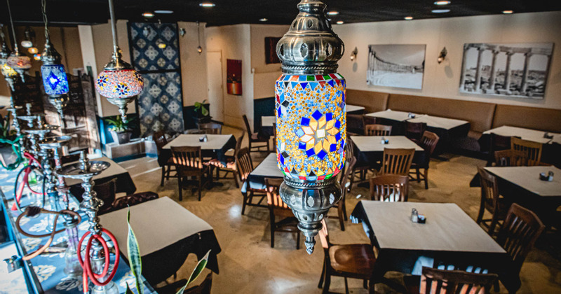Interior, colorful chandeliers and seating area