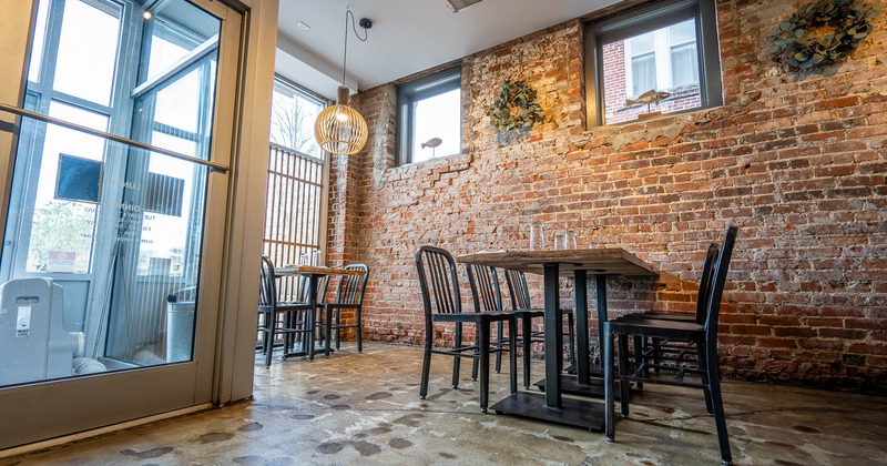 Interior, tables and chairs near window