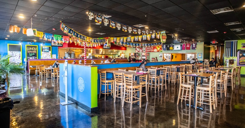 Interior, dining area, tables ready for guests