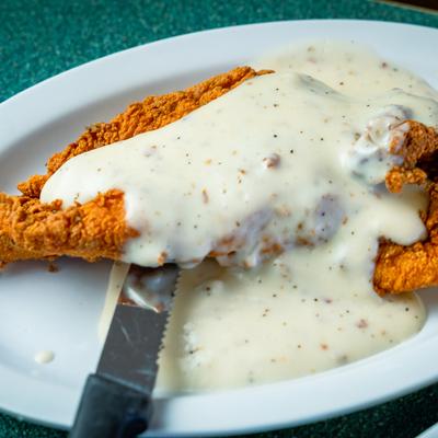 Country Fried Chicken topped with white gravy.