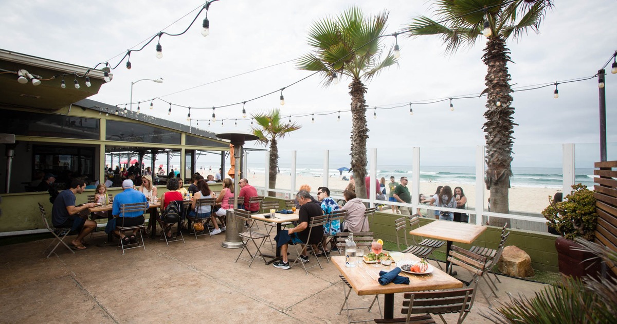 Exterior, open dining area with guests