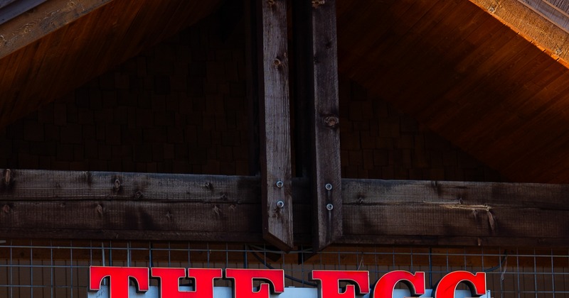 Frony of restaurant, sign above entrance