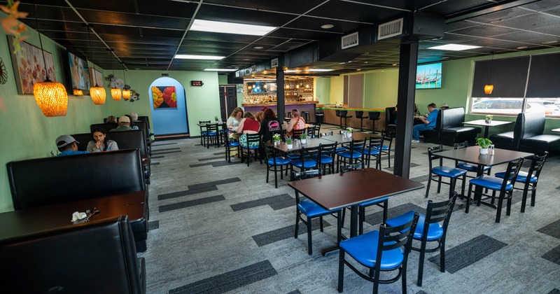 Interior, dining area with booths, tables and chairs