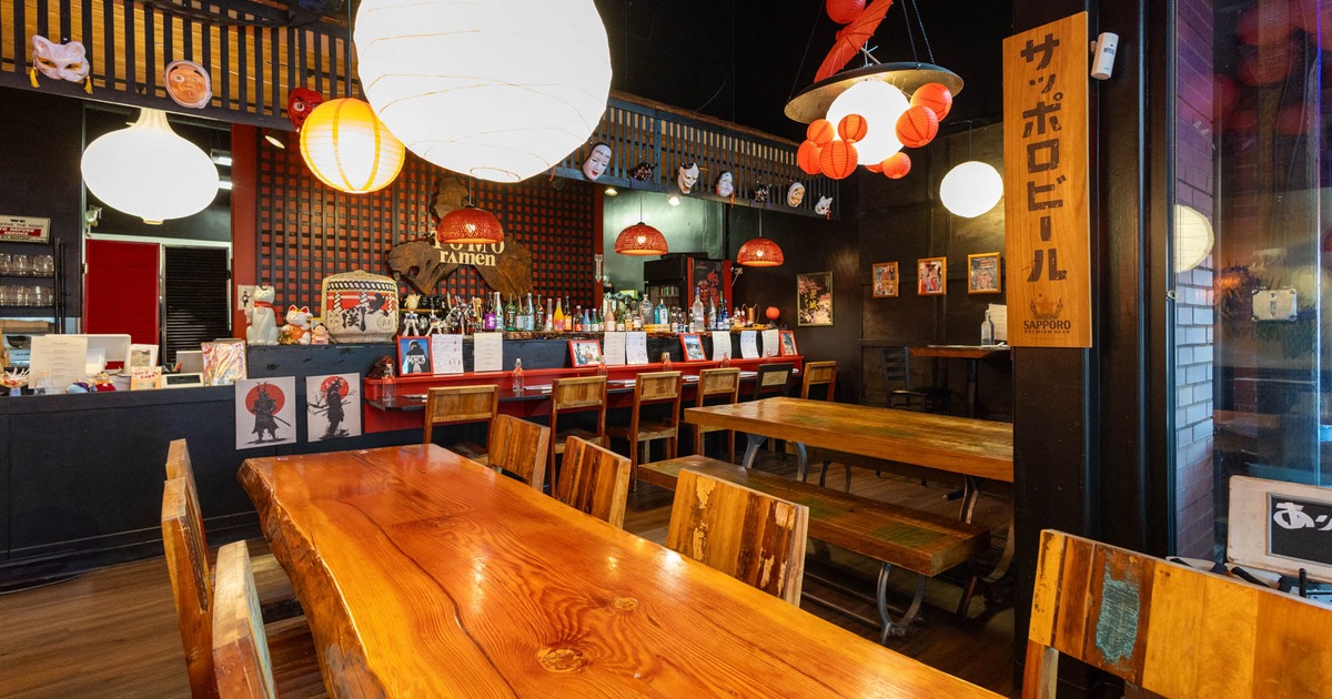 Interior, dining area, bar in the back
