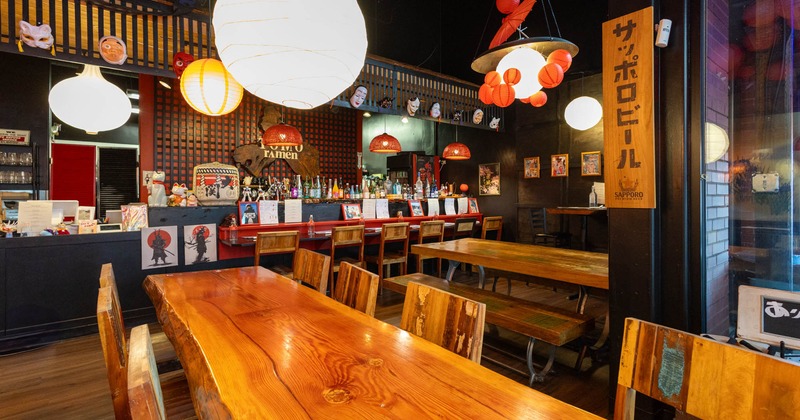 Interior, dining area, bar in the back