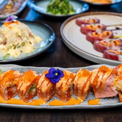 Pink Lady Roll, with other dishes on the table.