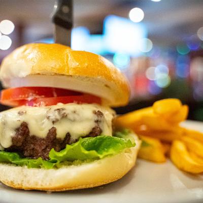 The Classic burger with a side of fries.