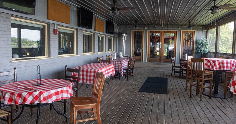 Interior, dining tables waiting to receive guests