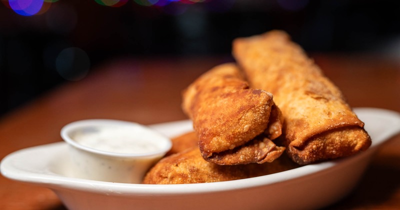 Buffalo Chicken Rolls, with blue cheese dressing