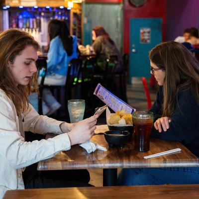 Customers sitting at the table.