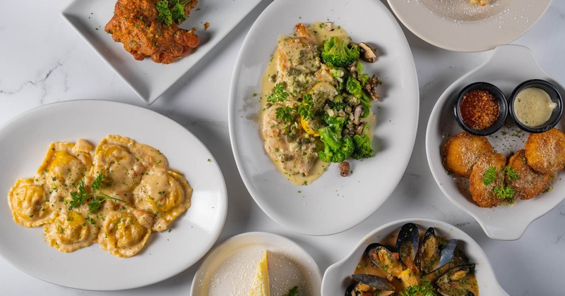 Various dishes served on the table, top view