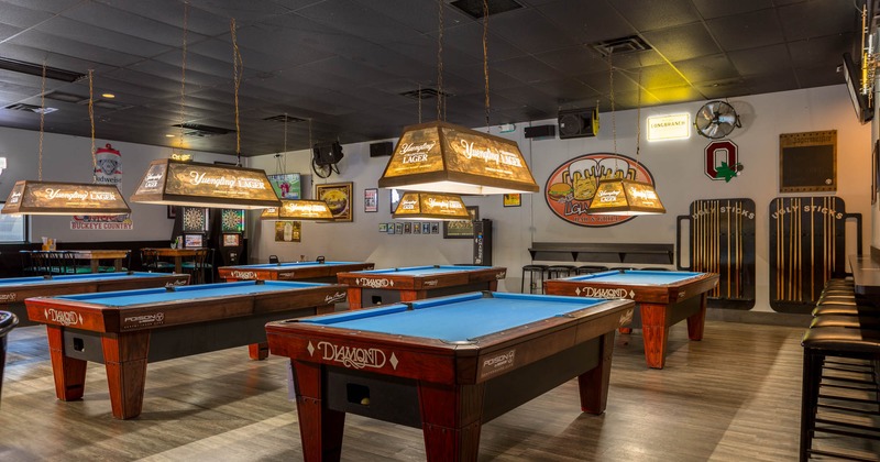 Interior, wide view, pool tables