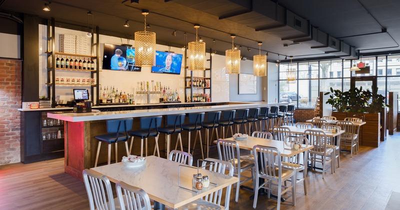 Interior, dining tables near the bar