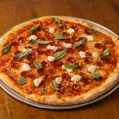 Pepperoni and ricotta pizza.