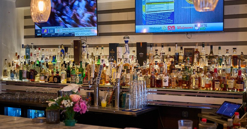 Various liquor bottles on the shelf