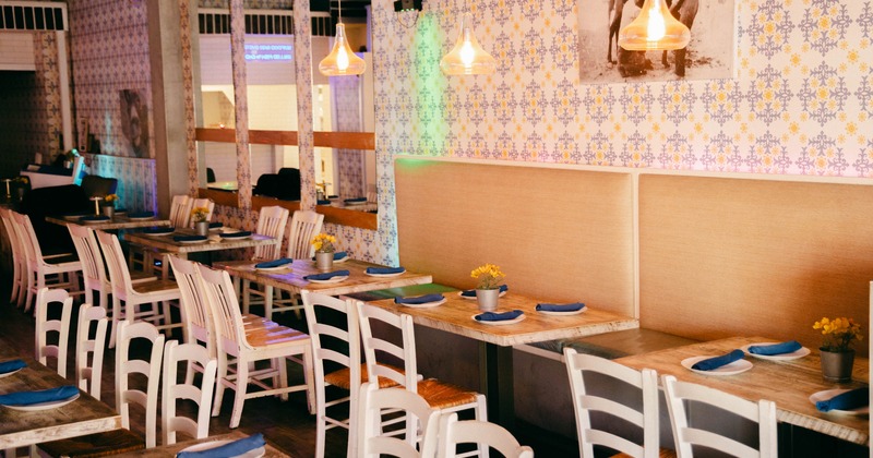 Interior, banquette seating, tables ready for guests