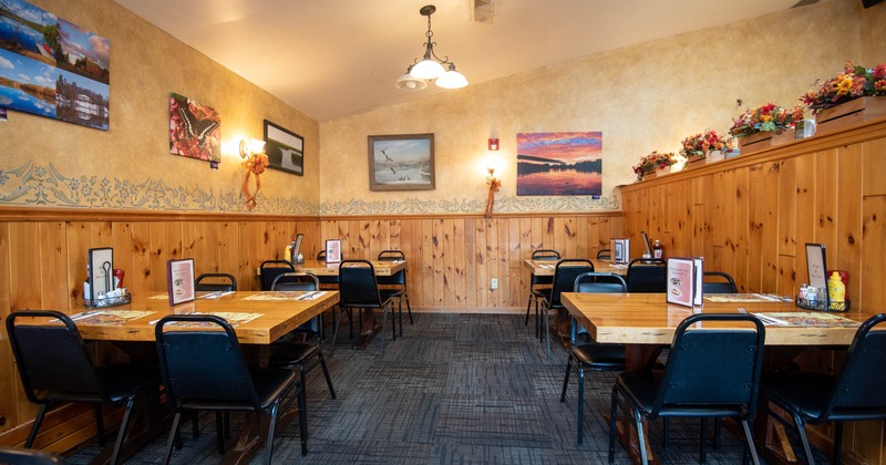 Interior, tables with chairs waiting for the guests