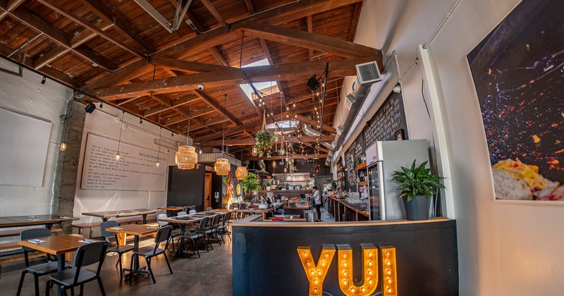 Diner tables, bar, wide view