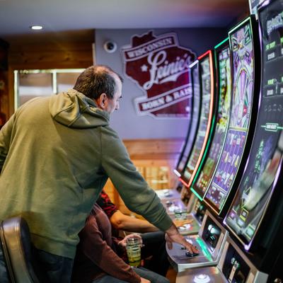 Gusests playing slot machines.