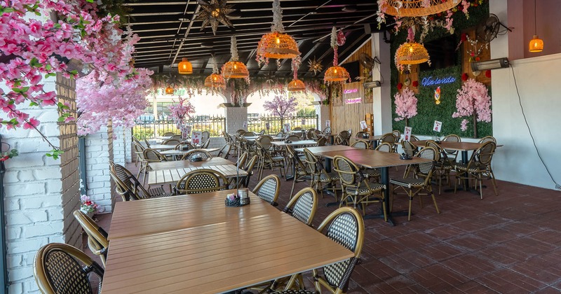 Exterior, patio, tables and chairs ready for guests