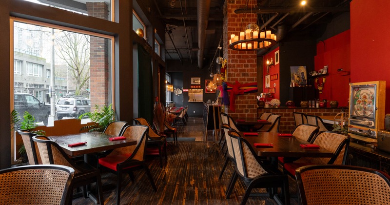 Interior, tables and chairs in dining area