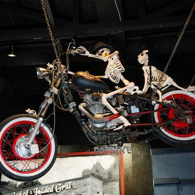 Interior decoration,  a hanging motorcycle with skeleton dummies
