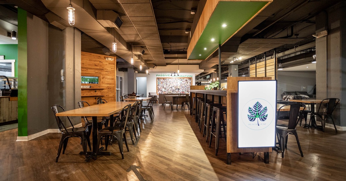 Interior, metal chairs and wooden tables