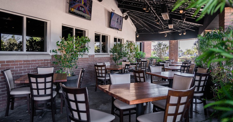Outside, seating area with tables and chairs