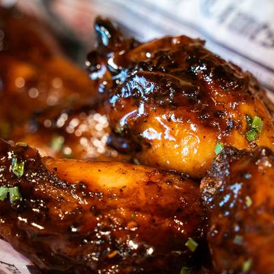 Smoked and fried chicken wings, close up.